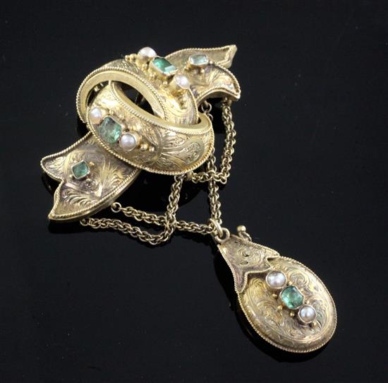 A Victorian Celtic Revival gold, emerald and pearl set drop pendant locket brooch, 67mm.